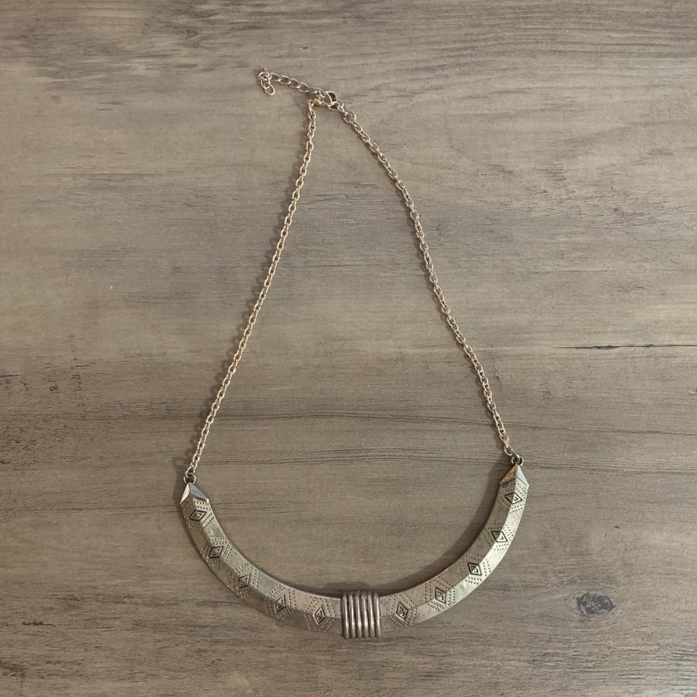 Gold collar-style necklace